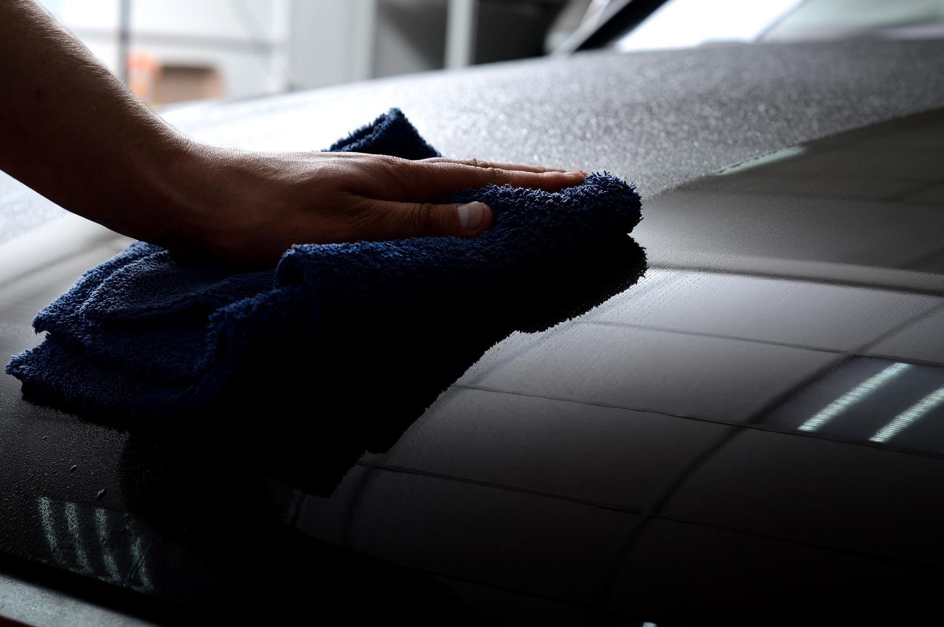 Car,Detailing,-,Man,Holds,A,Polisher,In,The,Hand Car,Detailing,-,Man,Holds,A,Polisher,In,The,Hand
